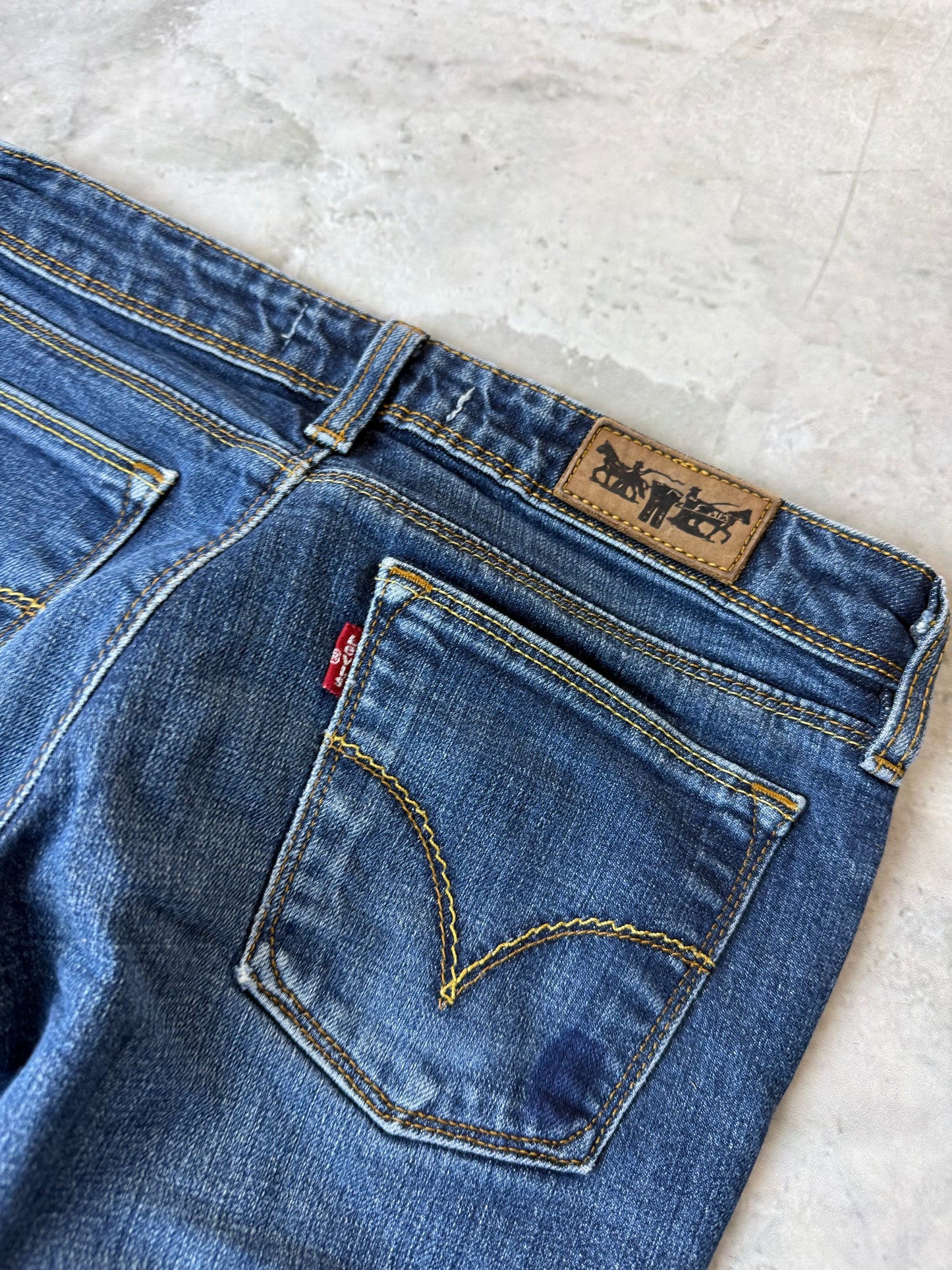 Levi's 572 Bootcut Herren Damen Jeans (XS)
